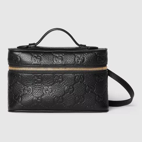 G*u*i cosmetic bags